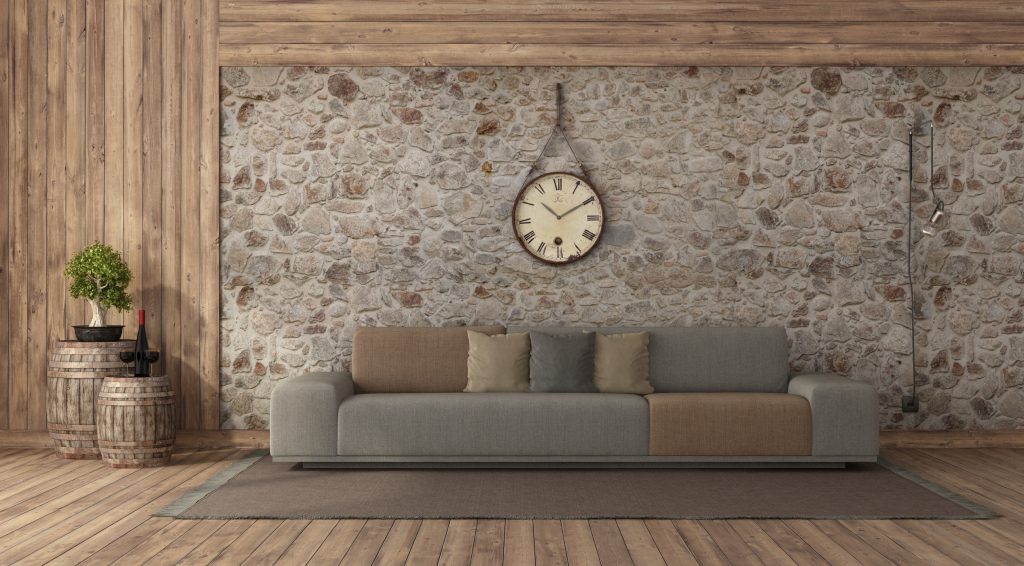 living room with stone wall cladding