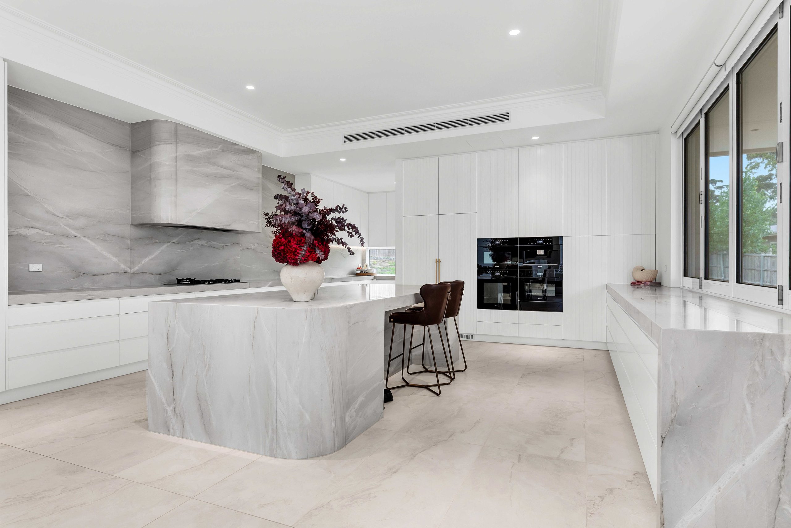 aurora gold kitchen island with rangehood